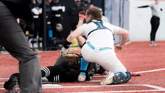 Softball play at the plate