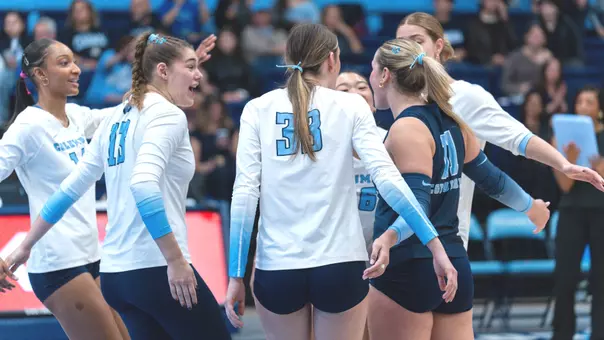 Volleyball celebrates vs Cornell