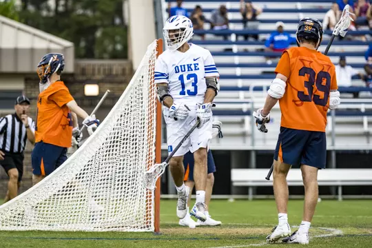 Owen Caputo celebrates a play against Virginia