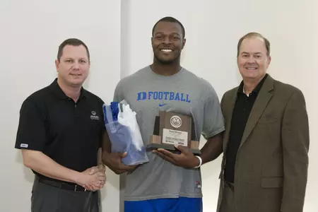 Morgan Surprised With AFCA Honors