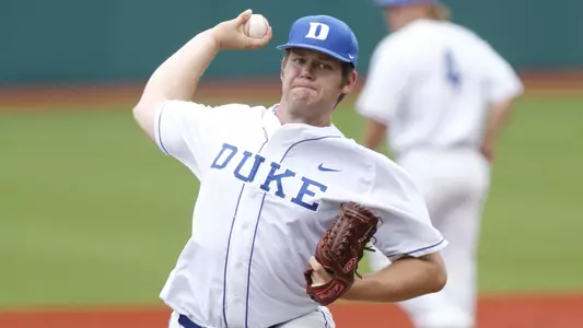 Brown, Hendrix Combine for Three-Hit Shutout