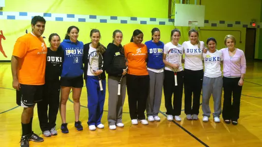 Blue Devils Introduce Tennis to C.C. Spaulding