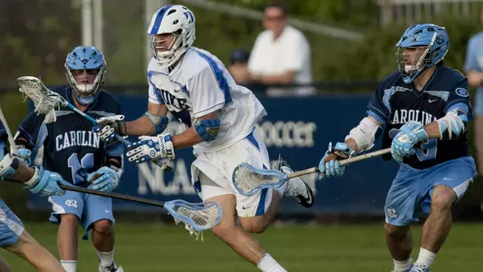 Wolf leads Duke past North Carolina, 13-11