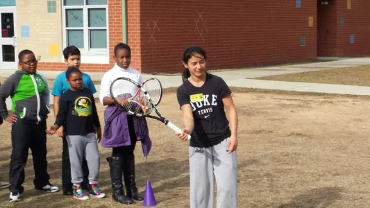 Members of Duke Tennis Teach Sport at Local Schools