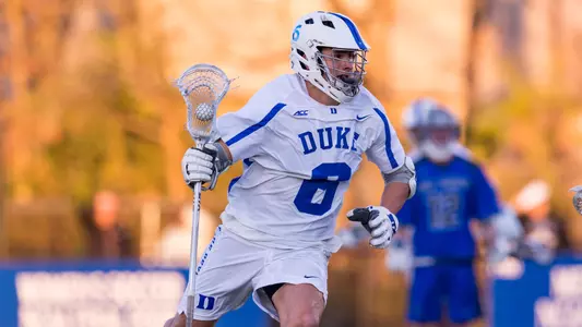 No. 1 Denver Pulls Away in 4th to Upend Blue Devils