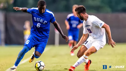 Moseley Paces Duke to Wild 4-3 Victory over Wisconsin