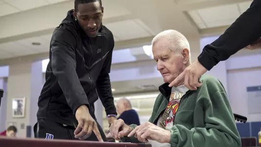 Blue Devils Visit Air Force Base and Veterans Home
