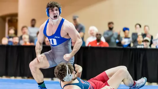 Blue Devils Rally to Beat Penn, 25-18