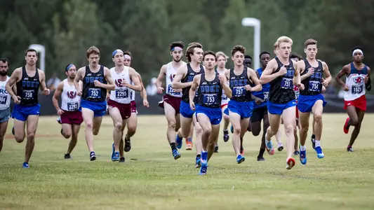 Duke men's cross country team running at the Roy Griak Invite
