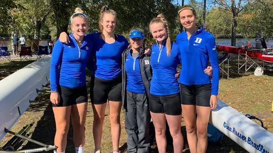 Duke's Club 4+ boat posing for a picture at the 55th Head of the Charles