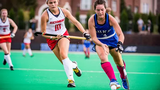 Hannah Miller dribbling past a Richmond defender