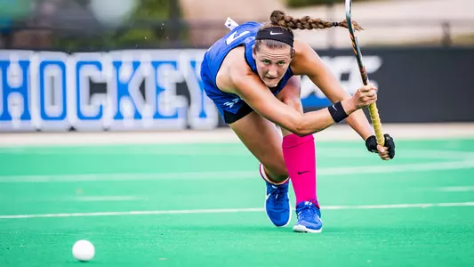 Jillian Wolgemuth passing the ball against Richmond