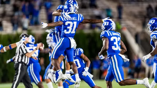 The Duke defense celebrates after stopping the Panthers during their game.