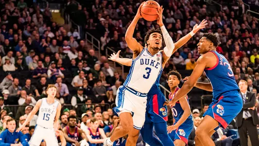 Tre Jones attempting a shot against Kansas