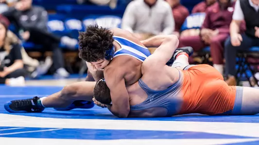 Russell Garners Ranked Victory in Setback to UVA