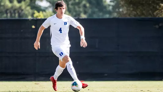 Duke's Sergi Nus dribbles the ball up the field