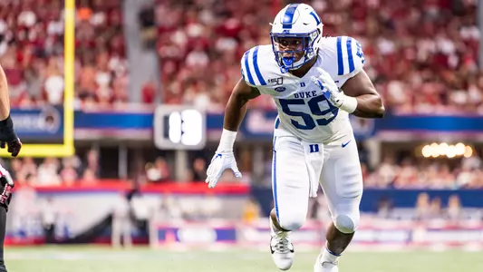 Senior DE Tre Hornbuckle gets ready to make a tackle against Alabama on Saturday