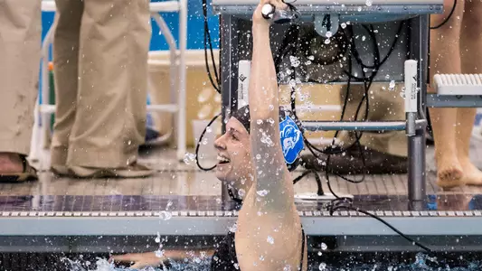 Christine Wixted celebrating in the pool