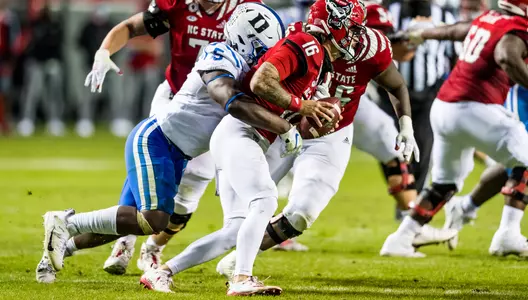 Victor Dimukeje takes down the NC State QB during Duke's game against them in 2020