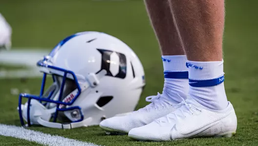 A helmet and a pair of shoes are pictured prior to one of Duke's game.
