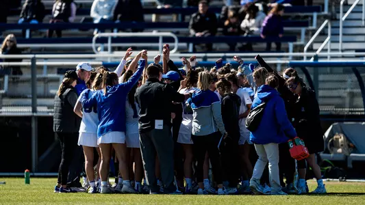 Women's lacrosse huddle