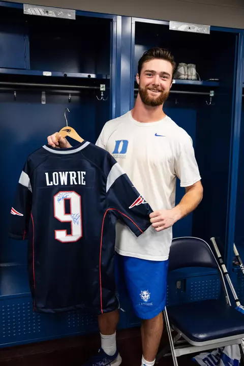 2018 May 25: Sean Lowrie #9 of the Duke Blue Devils is presented a Patriots jersey by the New England Patriots organization at Gillette Stadium in Foxborough, MA.