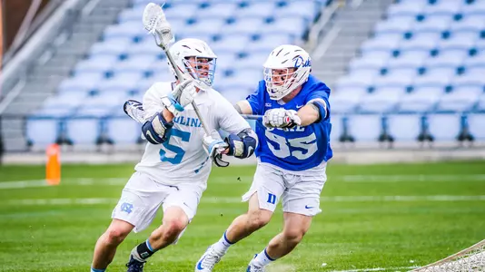 Blake Leischow plays defense against North Carolina