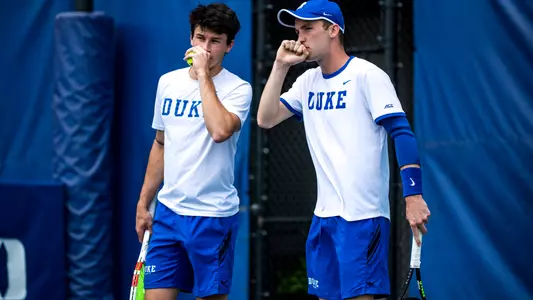 Garrett Johns and Andrew Dale discuss how they want to handle the next serve against No. 11 Wake Forest