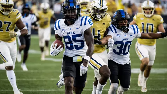 Sahmir Hagans runs a punt back for the touchdown against Georgia Tech