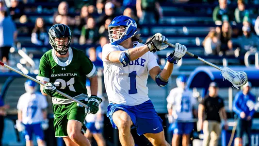 Garrett Leadmon takes a shot against Manhattan