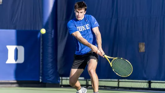 Garrett Johns battles against Virginia