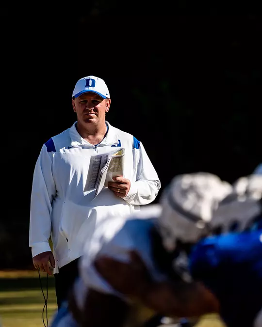 Football head coach Mike Elko at practice