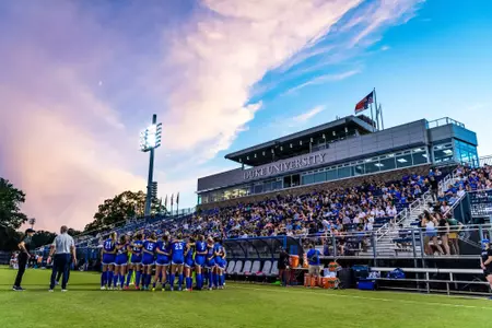 Fans cheer on the Duke women's soccer team during a 2022 home game in Koskinen Stadium