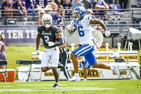 Eli Pancol runs with the ball during Duke's win at Northwestern