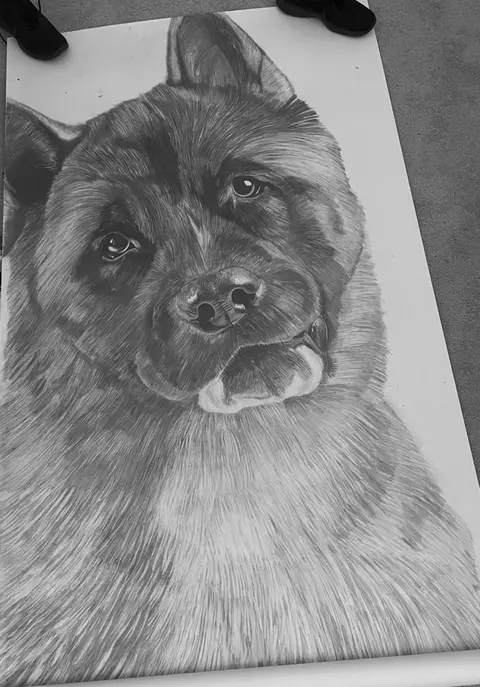 Charcoal drawing of Gabe Dinette's dog