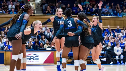 Duke volleyball celebrates in Cameron Indoor Stadium