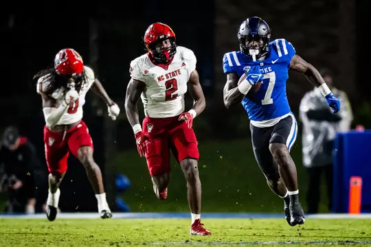 Jordan Waters runs the ball in Duke's game against NC State