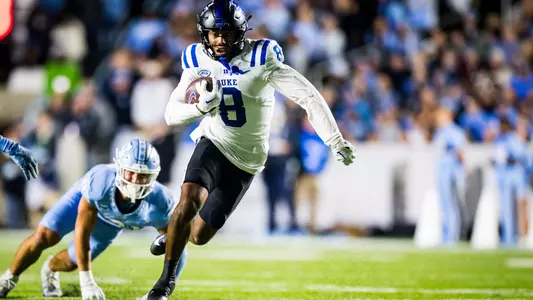 Jordan Moore rushes downfield against North Carolina