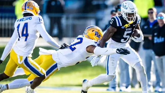 Jalon Calhoun makes a catch and rushes down field against Pittsburgh