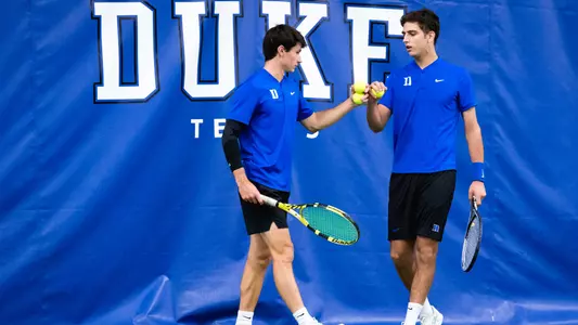 Garrett Johns and Pedro Rodenas celebrate after earning a doubles point