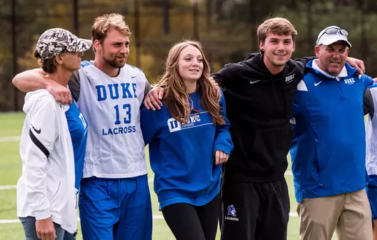 Mom Randi, Owen, youngest sister Jayme, Jake, and dad Ron Caputo at a Duke men's lacrosse scrimmage.