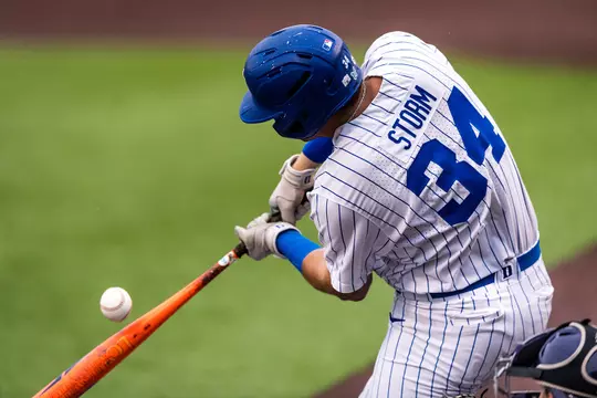 Duke baseball's Luke Storm swings at a pitch