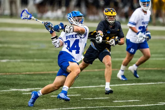 Duke's Brennan O'Neill fires a shot during the Blue Devils NCAA game against Michigan.