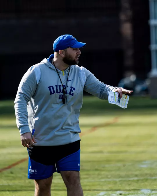 Tyler Santucci gives instruction during a 2023 spring Duke football practice