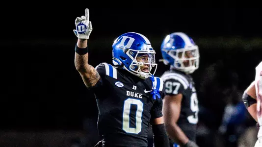 Chandler Rivers waves against Virginia Tech.