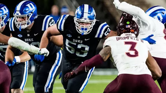 Brian Parker II moves down the field to make a block against Virginia Tech.