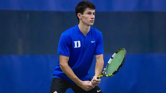 Garrett Johns competes against Kentucky