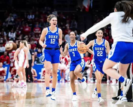 Delaney Thomas and the Duke women's basketball team celebrate a March Madness defeat of Ohio State.