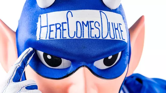 Duke Blue Devil mascot poses for a photo