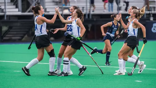 Duke field hockey celebrates a goal against Old Dominion